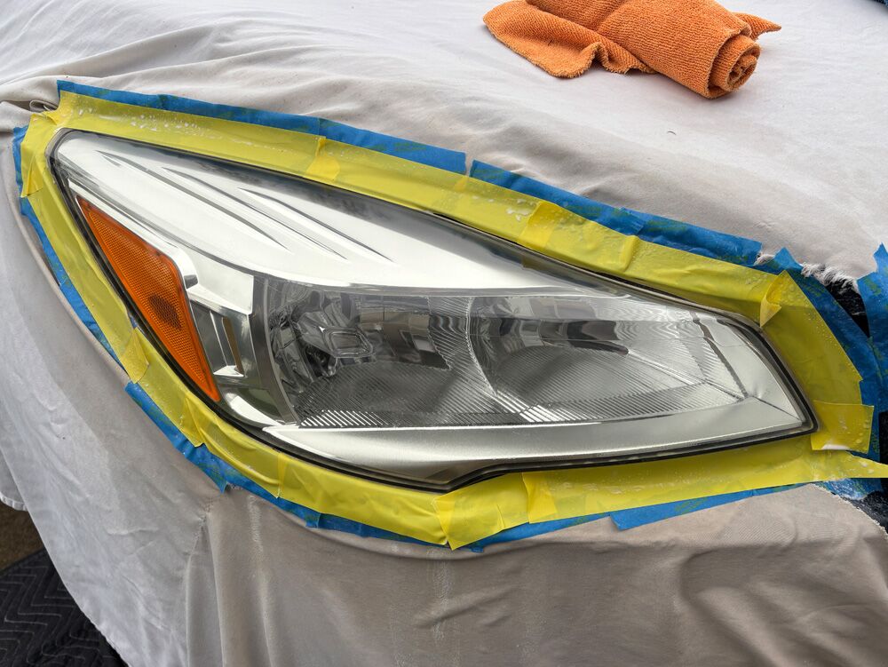 ford escape headlight after large