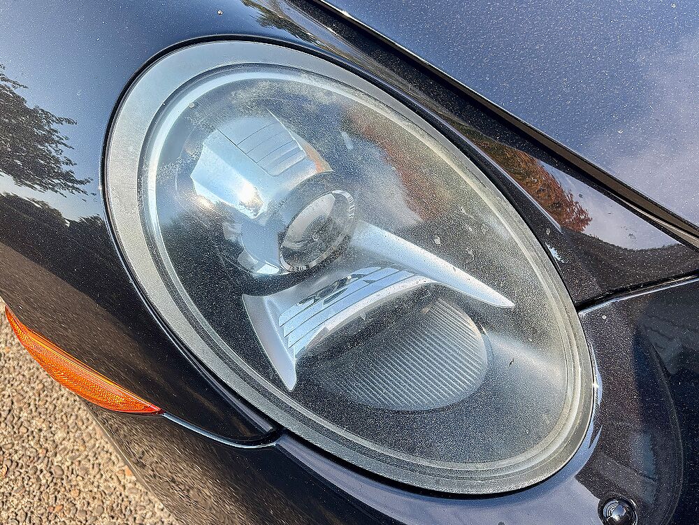 porsche carerra headlight before large